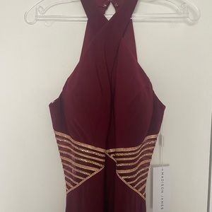 Madison James red and gold prom dress.